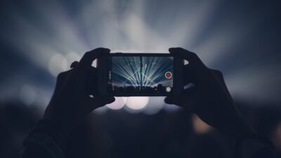 iphone, concert, lights, stage lights, record, video, recording, video recording, capture, apple product, hands, audience, event, live event, live performance, dark, party, smartphone, crowd, video, video, video, video, video